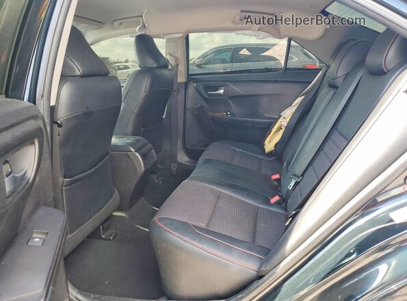 4T1BF1FK4GU181592 2016 TOYOTA CAMRY Charcoal Rear interior view