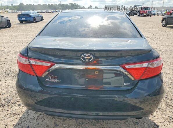 4T1BF1FK4GU181592 2016 TOYOTA CAMRY Charcoal Rear view