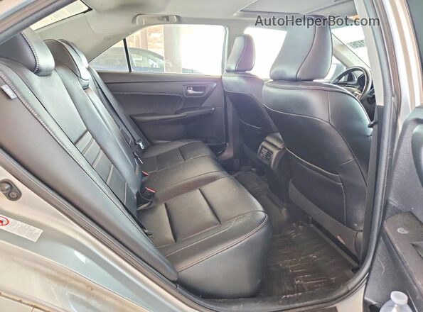 4T1BF1FK4GU558972 2016 TOYOTA CAMRY Silver Rear seats view