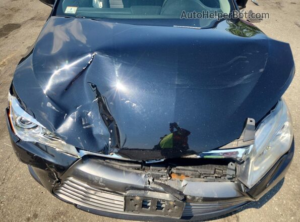 4T1BF1FK4HU397704 2017 TOYOTA CAMRY Black Widok wnętrza z tyłu