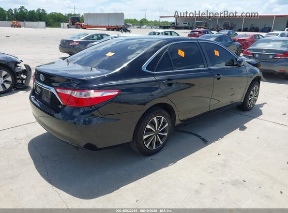 4T1BF1FK4HU651265 2017 TOYOTA CAMRY Black Trasero derecho