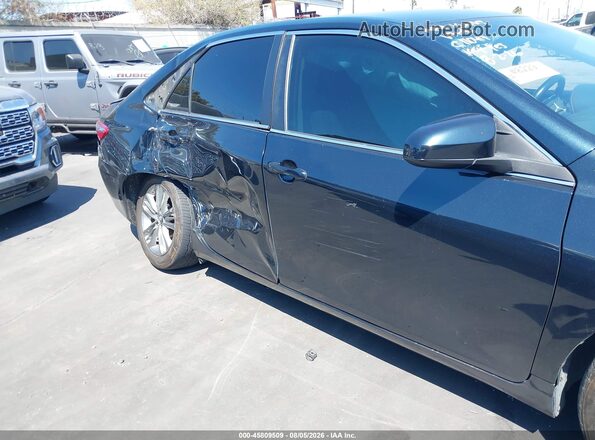4T1BF1FK5GU207696 2016 TOYOTA CAMRY Black Widok wnętrza z tyłu