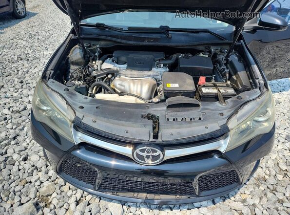 4T1BF1FK5HU296591 2017 TOYOTA CAMRY Black Vista interior trasera