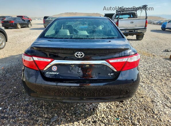 4T1BF1FK6HU351808 2017 TOYOTA CAMRY Black Rear view