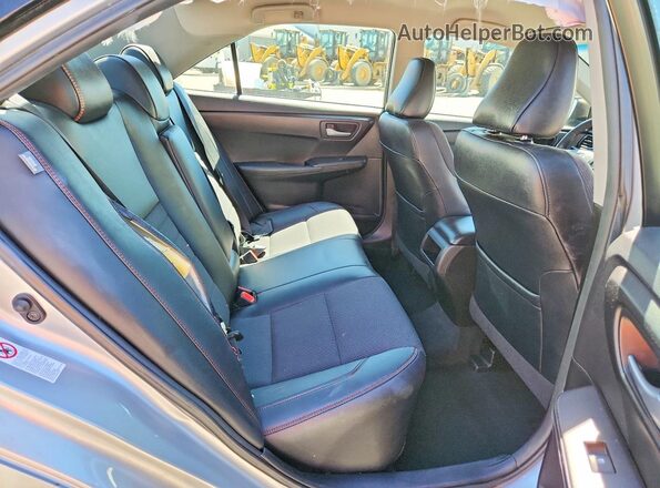 4T1BF1FK7GU525027 2016 TOYOTA CAMRY Silver Rear seats view