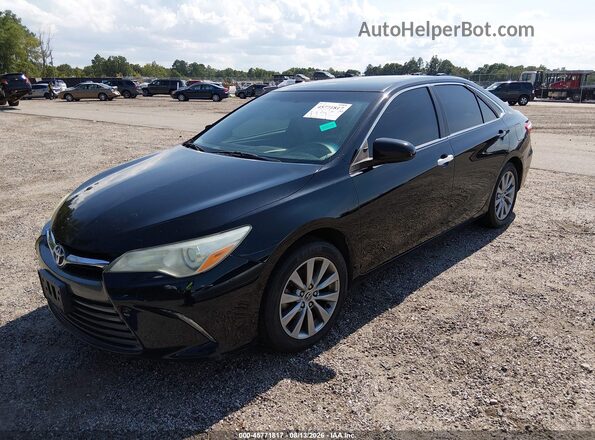 4T1BF1FK7GU552101 2016 TOYOTA CAMRY Black Vista tres cuartos delantera izquierda