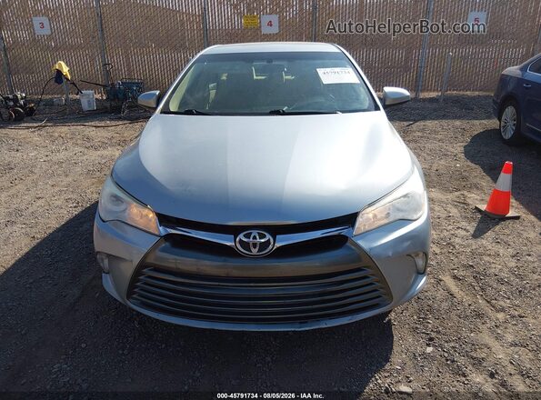 4T1BF1FK7HU364258 2017 TOYOTA CAMRY Gray Առջևի վահանակի տեսք