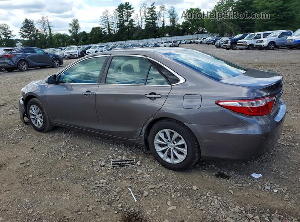 4T1BF1FK7HU679657 2017 TOYOTA CAMRY Gray Trasero izquierdo
