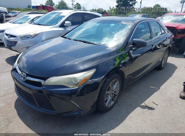 4T1BF1FK8GU138339 2016 TOYOTA CAMRY Black Vista tres cuartos delantera izquierda