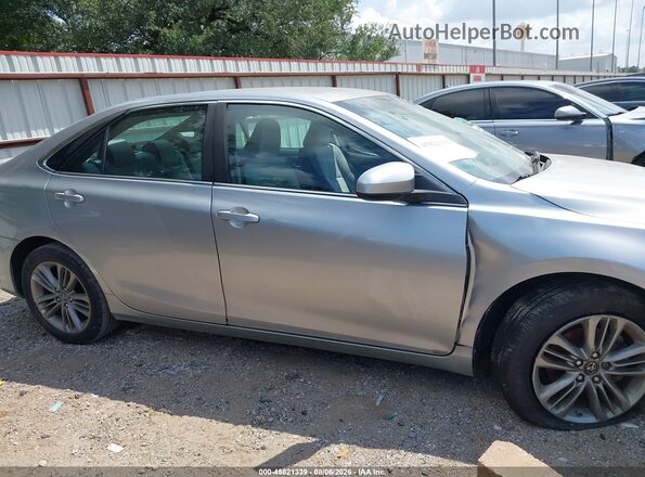 4T1BF1FK8GU596348 2016 TOYOTA CAMRY Silver Vista interior trasera