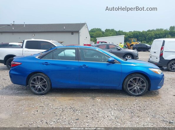 4T1BF1FK8GU999861 2016 TOYOTA CAMRY Blue Widok wnętrza z tyłu
