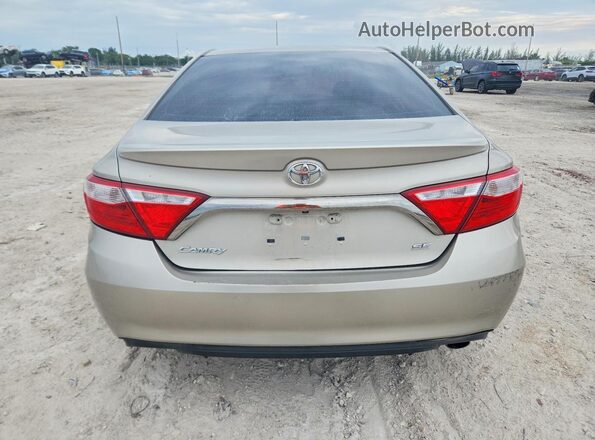 4T1BF1FK9GU546705 2016 TOYOTA CAMRY Бежевый Вид сзади