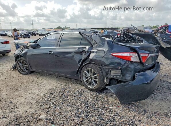 4T1BF1FKXGU260488 2016 TOYOTA CAMRY Black Trasero izquierdo