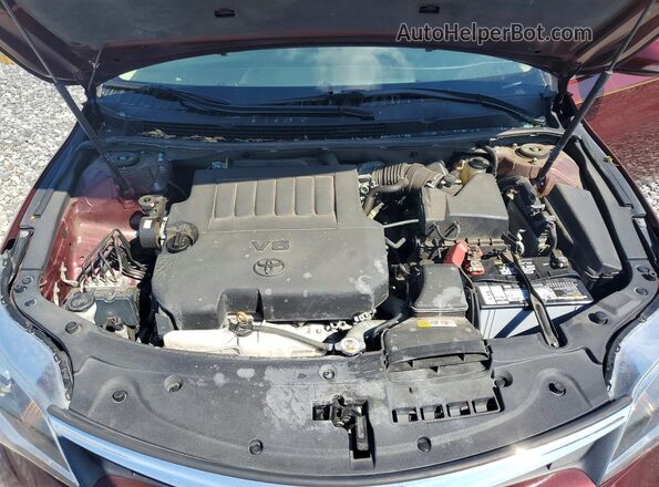 4T1BK1EB2JU267391 2018 TOYOTA AVALON Burgundy Rear interior view