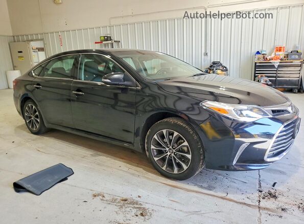 4T1BK1EB2JU286278 2018 TOYOTA AVALON Black Front right