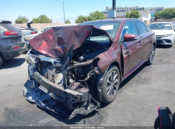 4T1BK1EB4JU271667 2018 TOYOTA AVALON Burgundy Vista tres cuartos delantera izquierda