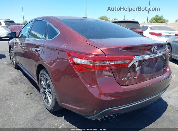 4T1BK1EB4JU271667 2018 TOYOTA AVALON Burgundy Trasero izquierdo