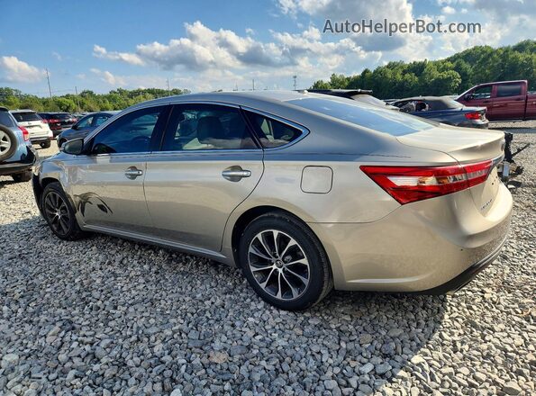 4T1BK1EB6JU268155 2018 TOYOTA AVALON Beige Rear left