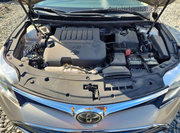 4T1BK1EB6JU268155 2018 TOYOTA AVALON Beige Rear interior view