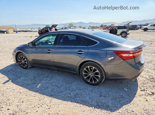 4T1BK1EB8JU282445 2018 TOYOTA AVALON Gray Trasero izquierdo