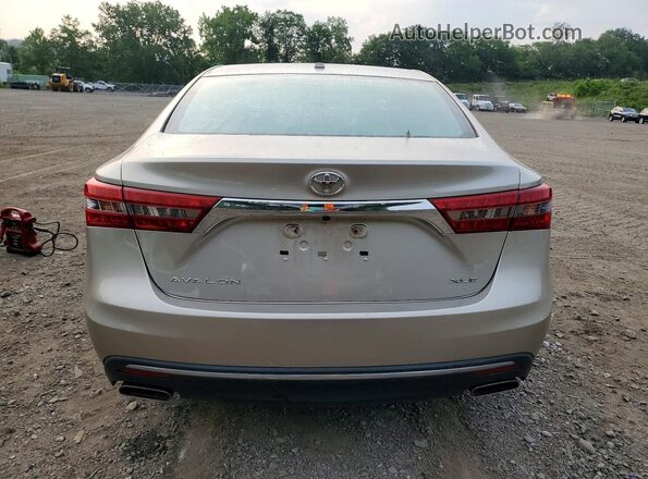 4T1BK1EB9GU200957 2016 TOYOTA AVALON Beige უკანა ხედი