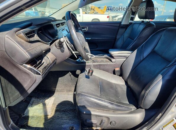 4T1BK1EB9JU280266 2018 TOYOTA AVALON Silver Widok wnętrza z przodu
