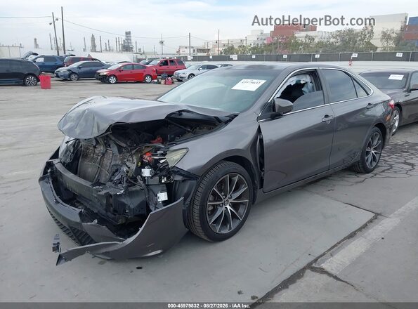 4T1BK1FK3GU569070 2016 TOYOTA CAMRY Gray Vista tres cuartos delantera izquierda