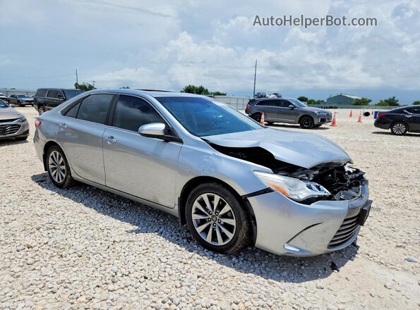 4T1BK1FK8GU575186 2016 TOYOTA CAMRY Серебряный Передняя правая четверть