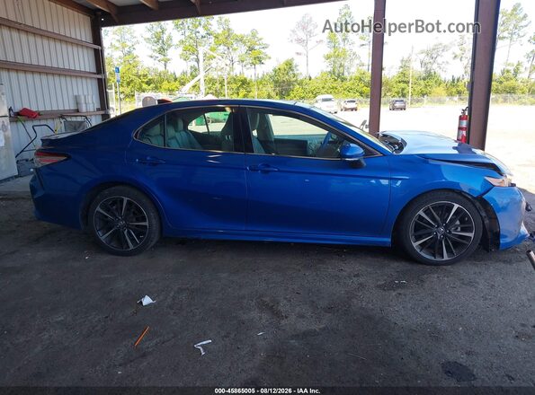 4T1BZ1HK2KU024091 2019 TOYOTA CAMRY Blue Widok wnętrza z tyłu