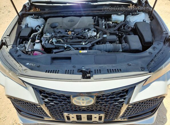 4T1DA1AB7NU012601 2022 TOYOTA AVALON Silver Widok wnętrza z tyłu