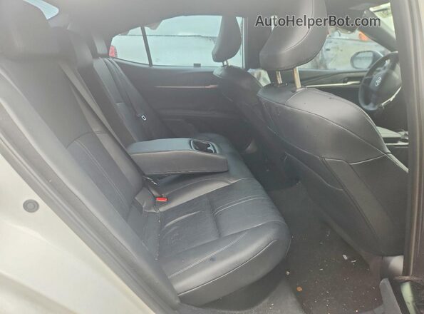 4T1DAACK0SU045013 2025 TOYOTA CAMRY White Rear seats view