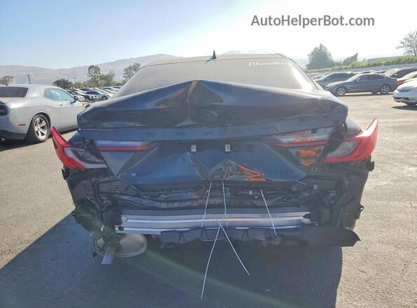 4T1DAACK0TU751044 2026 TOYOTA CAMRY Black Rear view