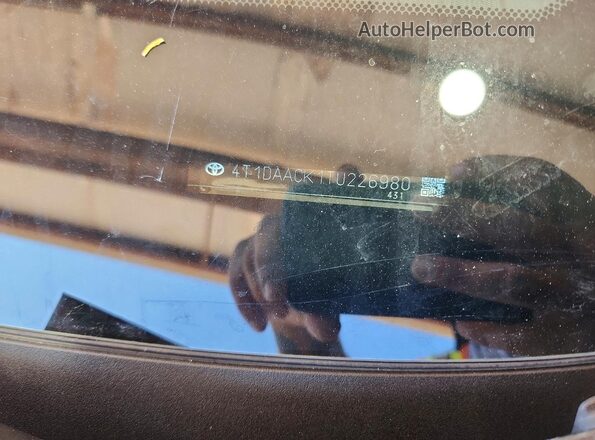 4T1DAACK1TU226980 2026 TOYOTA CAMRY Black VIN კოდის სტიკერის ხედი