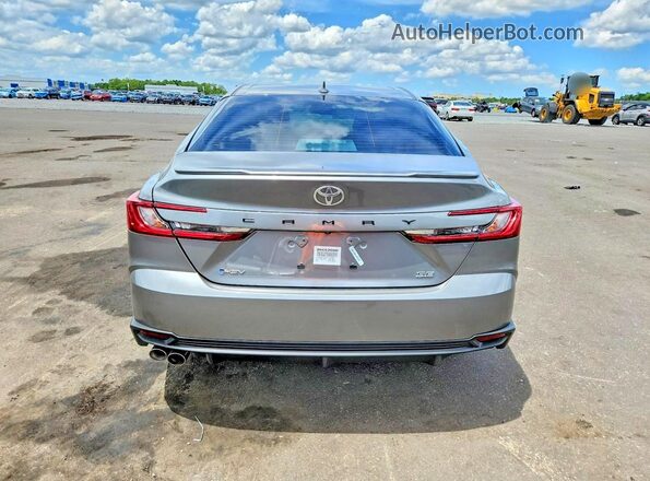 4T1DAACK1TU304027 2026 TOYOTA CAMRY Silver Rear view