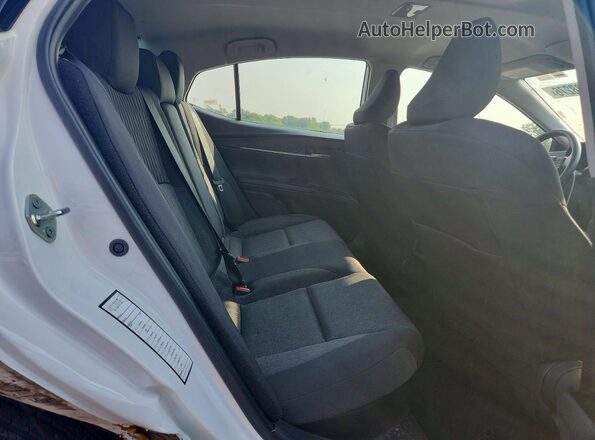 4T1DAACK1TU722877 2026 TOYOTA CAMRY White Rear seats view