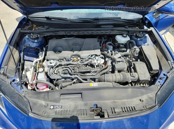 4T1DAACK2SU036023 2025 TOYOTA CAMRY Blue Rear interior view