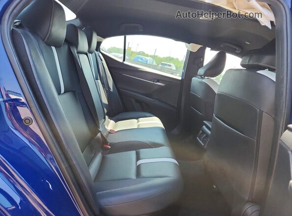 4T1DAACK2SU169784 2025 TOYOTA CAMRY Blue Vista de los asientos traseros