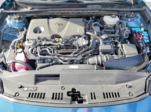 4T1DAACK2TU211128 2026 TOYOTA CAMRY Blue Вид задньої частини салону