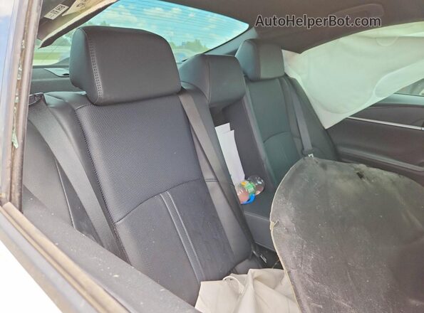 4T1DAACK3SU016959 2025 TOYOTA CAMRY White Vista de los asientos traseros