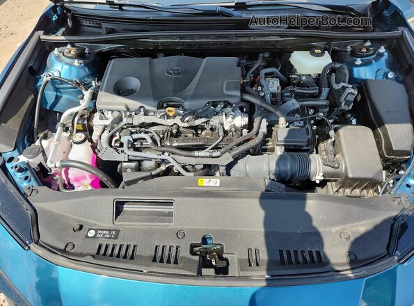 4T1DAACK3SU198162 2025 TOYOTA CAMRY Teal Widok wnętrza z tyłu
