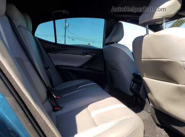 4T1DAACK3SU519293 2025 TOYOTA CAMRY Blue Rear seats view