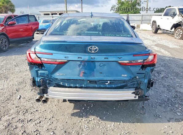 4T1DAACK3TU740295 2026 TOYOTA CAMRY Turquoise Rear view