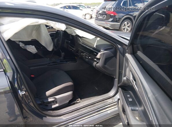 4T1DAACK4SU191298 2025 TOYOTA CAMRY Серый Вид салона спереди