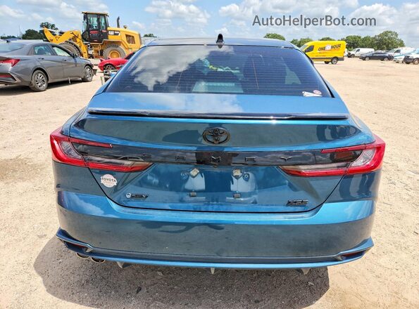 4T1DAACK4SU197621 2025 TOYOTA CAMRY Teal Vista trasera