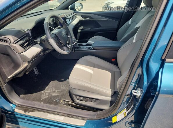 4T1DAACK4SU610606 2025 TOYOTA CAMRY Turquoise Вид салону спереду