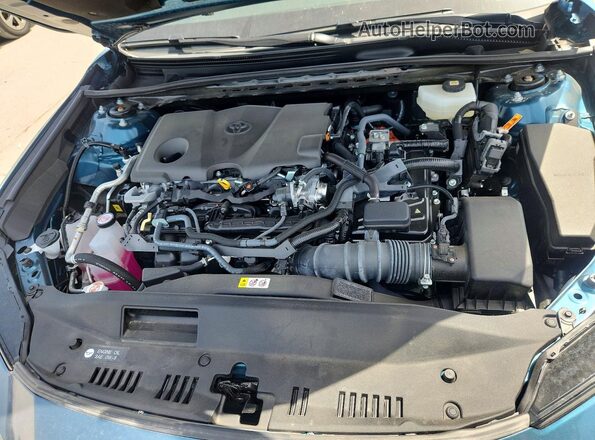4T1DAACK4SU610606 2025 TOYOTA CAMRY Turquoise Вид задньої частини салону