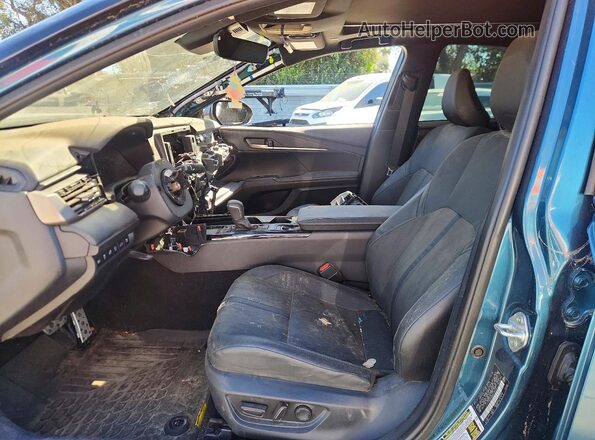 4T1DAACK5SU112172 2025 TOYOTA CAMRY Teal Вид салону спереду