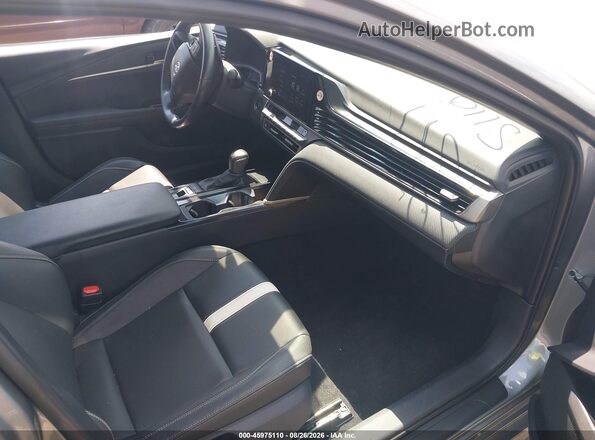 4T1DAACK7SU556623 2025 TOYOTA CAMRY Серый Вид салона спереди