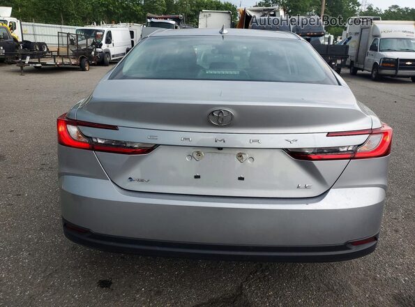 4T1DAACK9SU004038 2025 TOYOTA CAMRY Silver Rear view