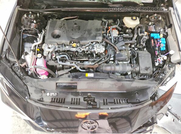 4T1DAACK9SU589946 2025 TOYOTA CAMRY Black Սալոնի հետևի տեսք